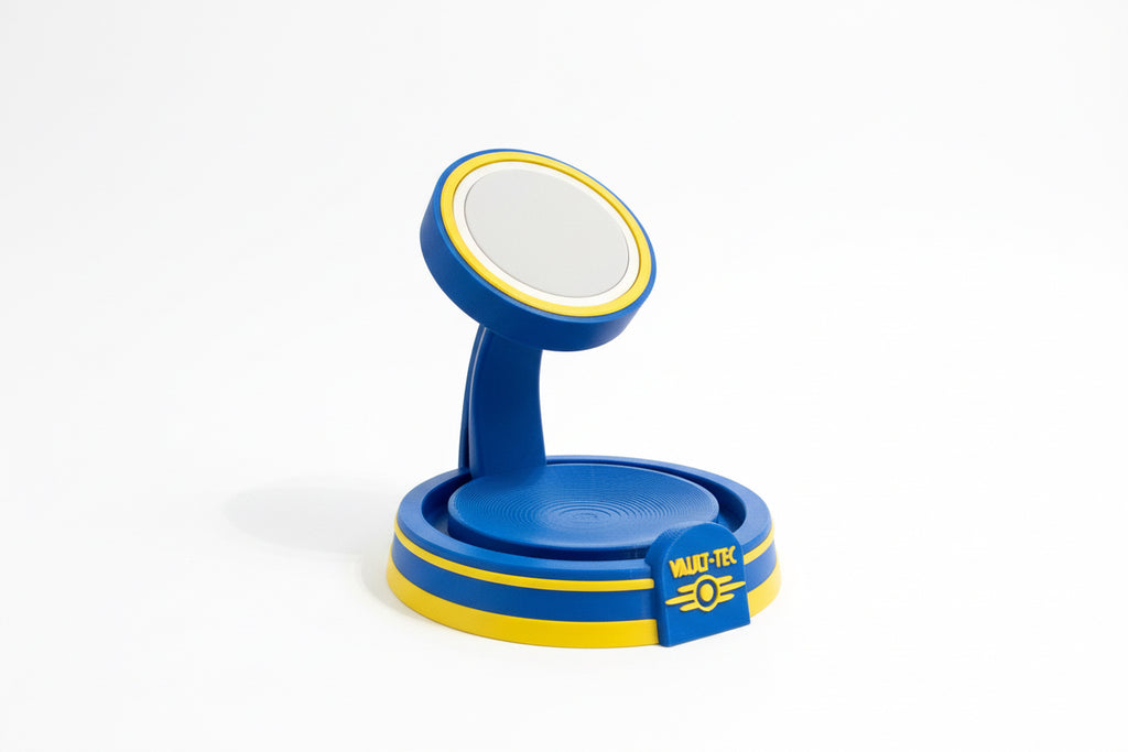 Blue and yellow fallout inspired phone holder on a textured surface with a neutral background