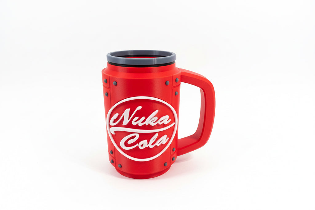 Red can holder with 'Nuka Cola' logo on a gray surface