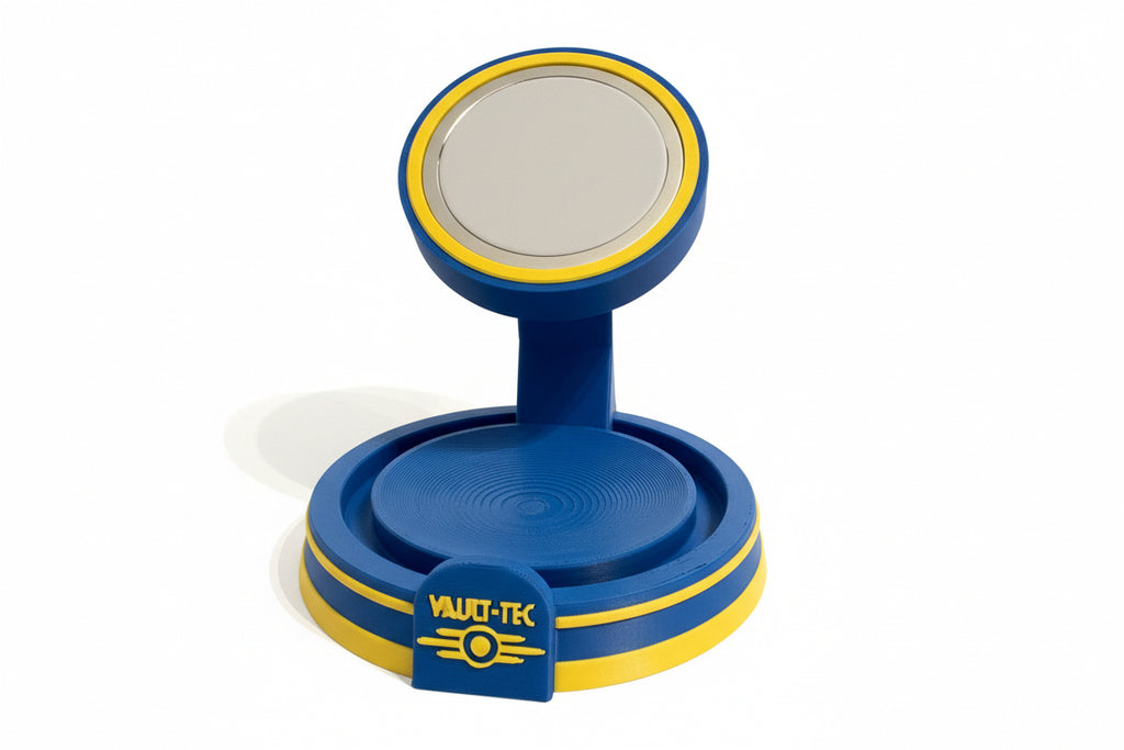 Blue and yellow iPhone charger mount with 'Vault-Tec' branding on a textured surface.