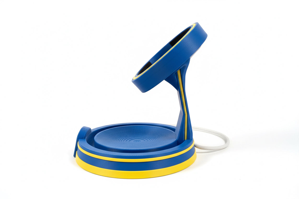 Blue and yellow fallout inspired MagSafe mount on a textured surface with a white background