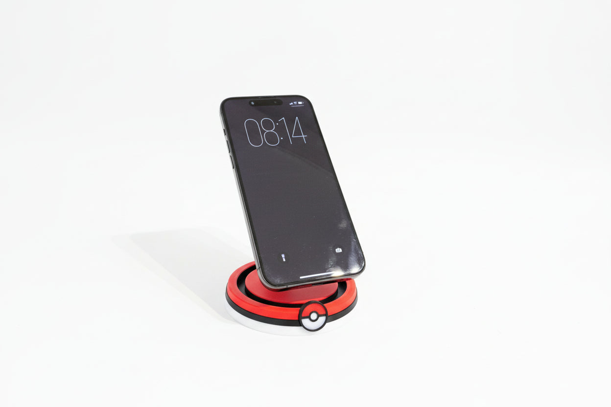 Pokemon inspired iphone magsafe charger. Designed to look like a pokeball with red, blue and white colours