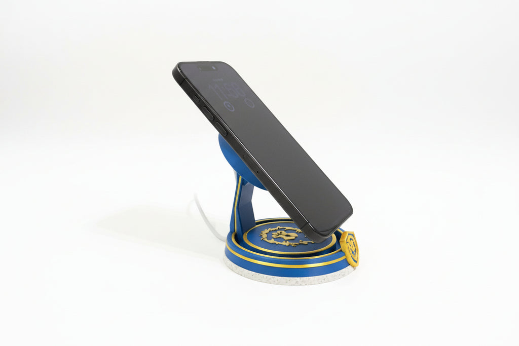 Phone on a Alliance themed magssafe charger and stand