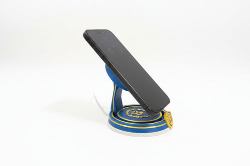 Phone on a Alliance themed magssafe charger and stand