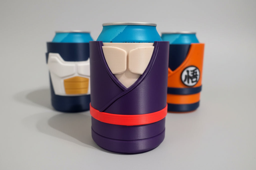 DBZ can holder with red band and beige interior, surrounded by other colorful can holders on a textured surface.